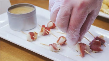 Bacon Wrapped Scallops and Black Garlic Sauce